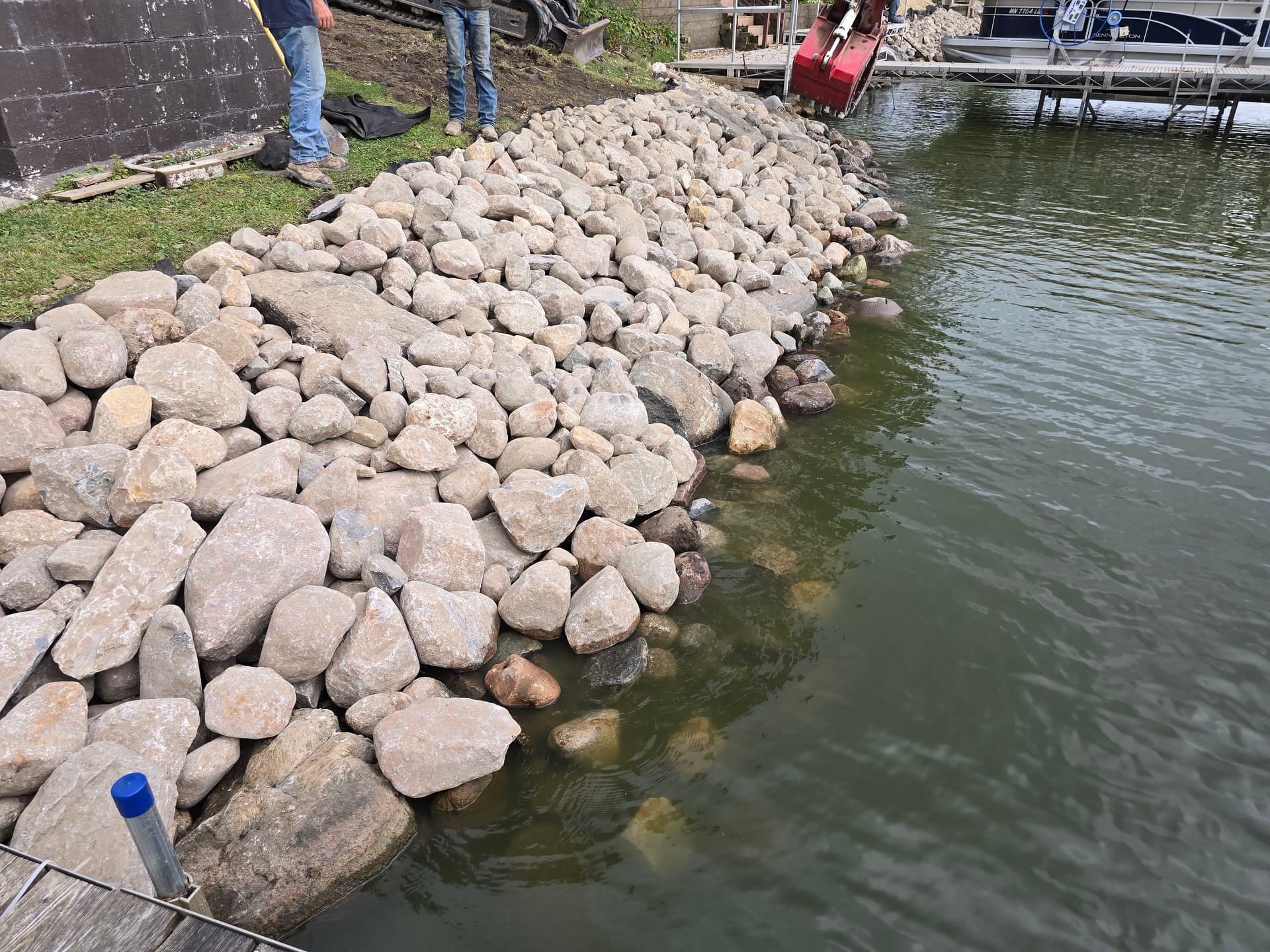 rip-rap shoreline erosion control in the faribault lakes area image