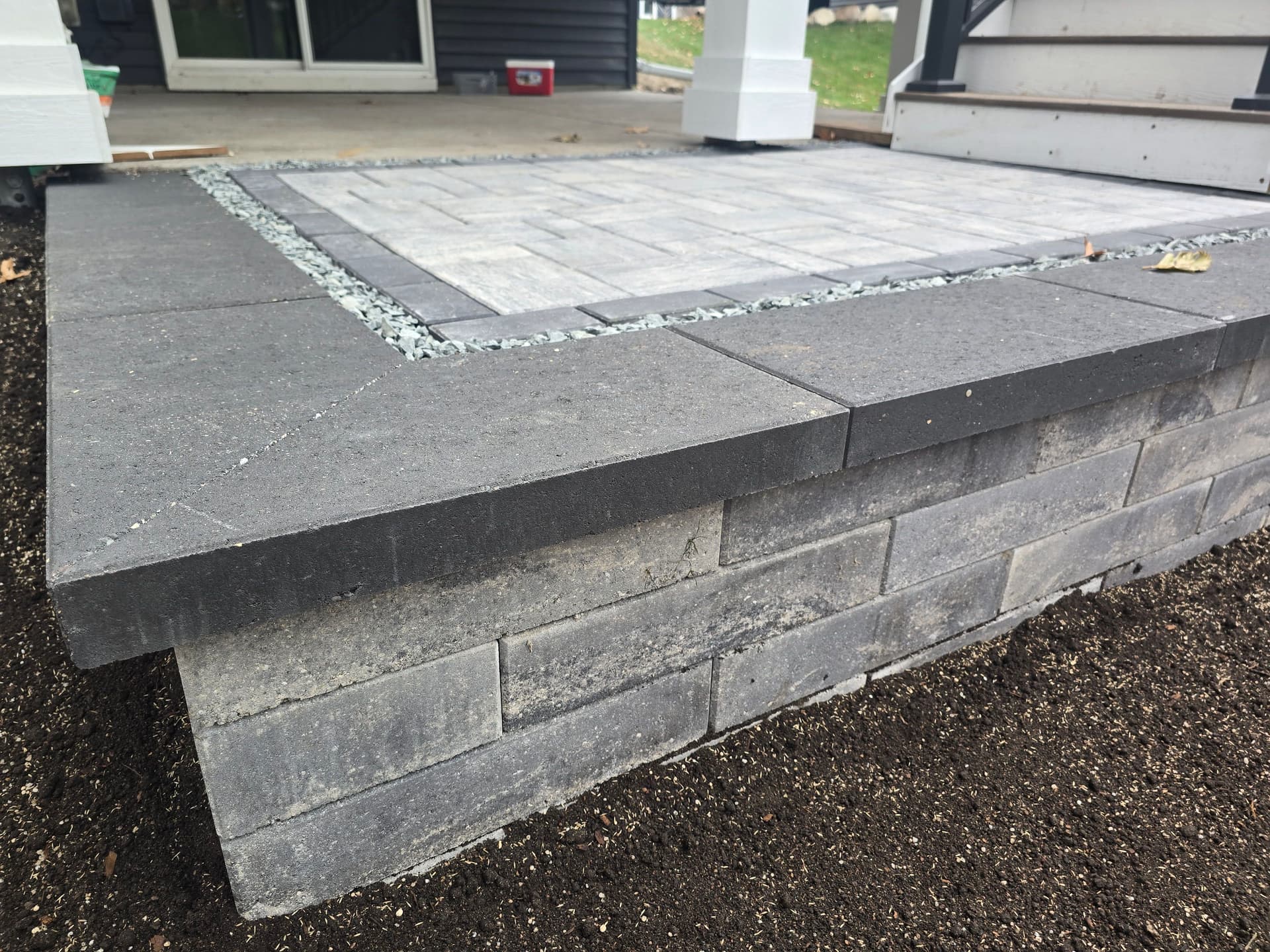 Modern Deck Stair Landing with Belgard Blocks