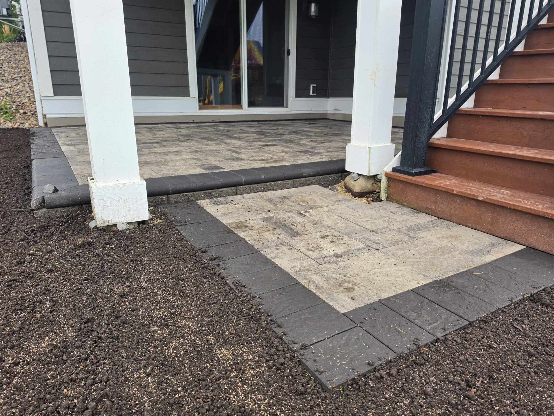 Gallery photos for Paver Patio Installation Around Existing Deck Stairs: Image #2