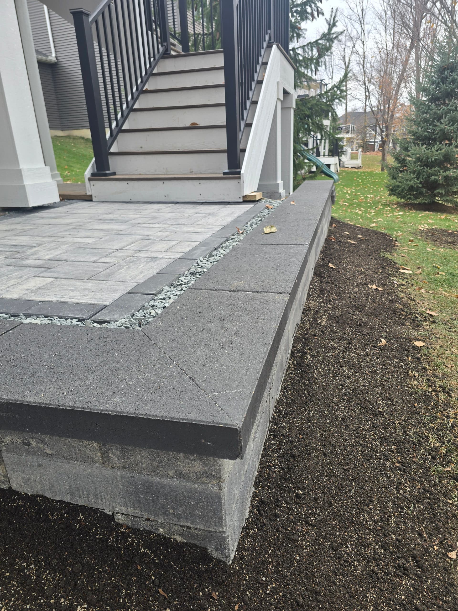 Modern Deck Stair Landing with Belgard Blocks