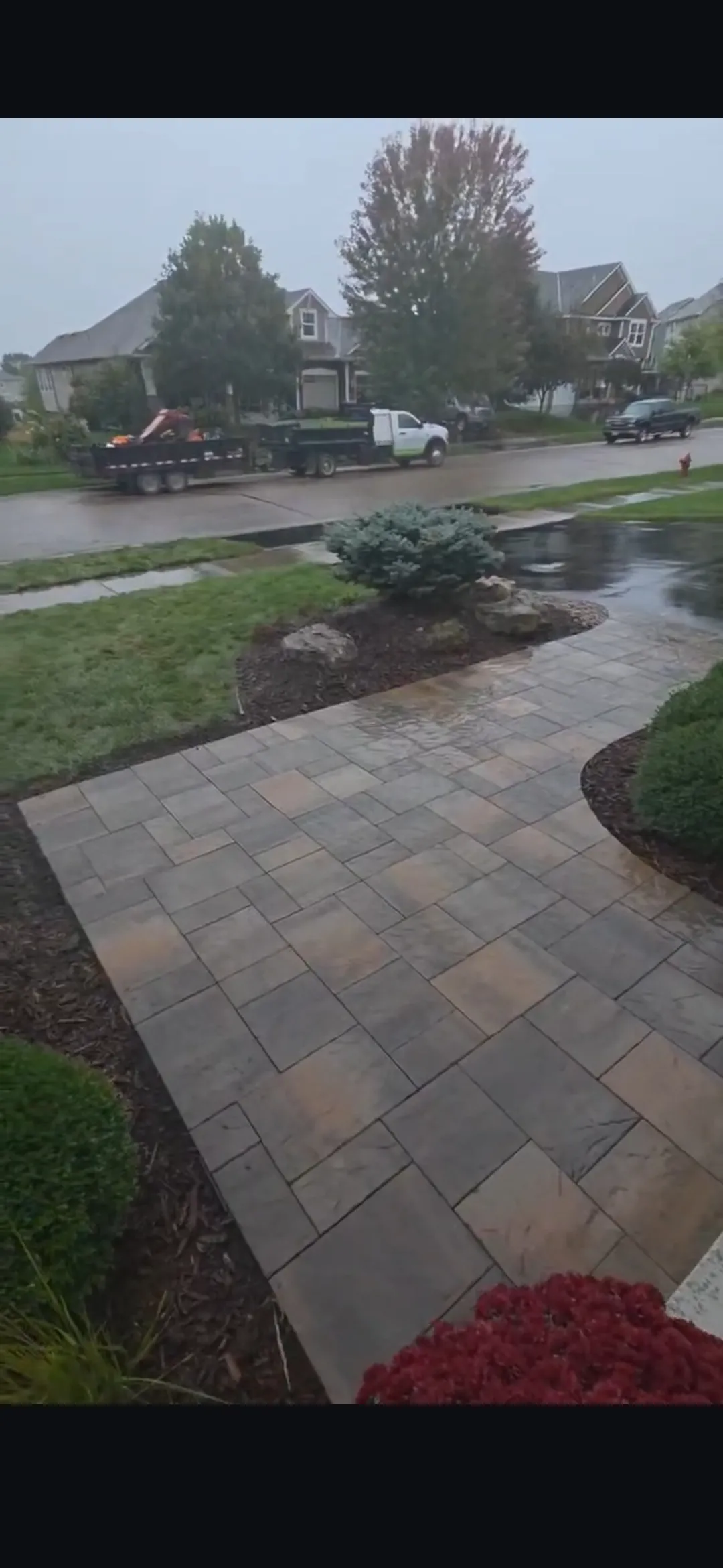 Paver Sidewalk Install Finished in the Pouring Rain image