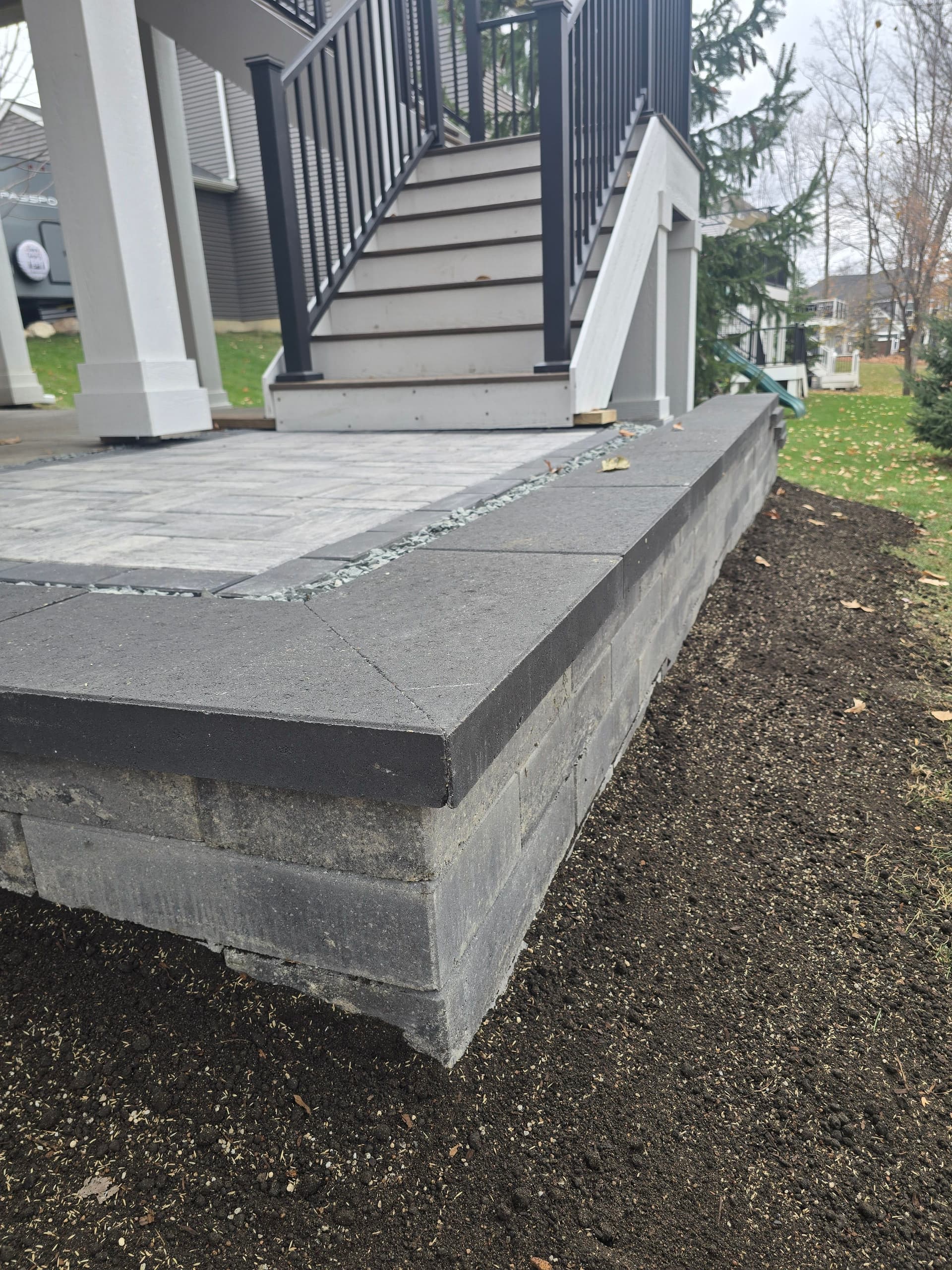 Modern Deck Stair Landing with Belgard Blocks