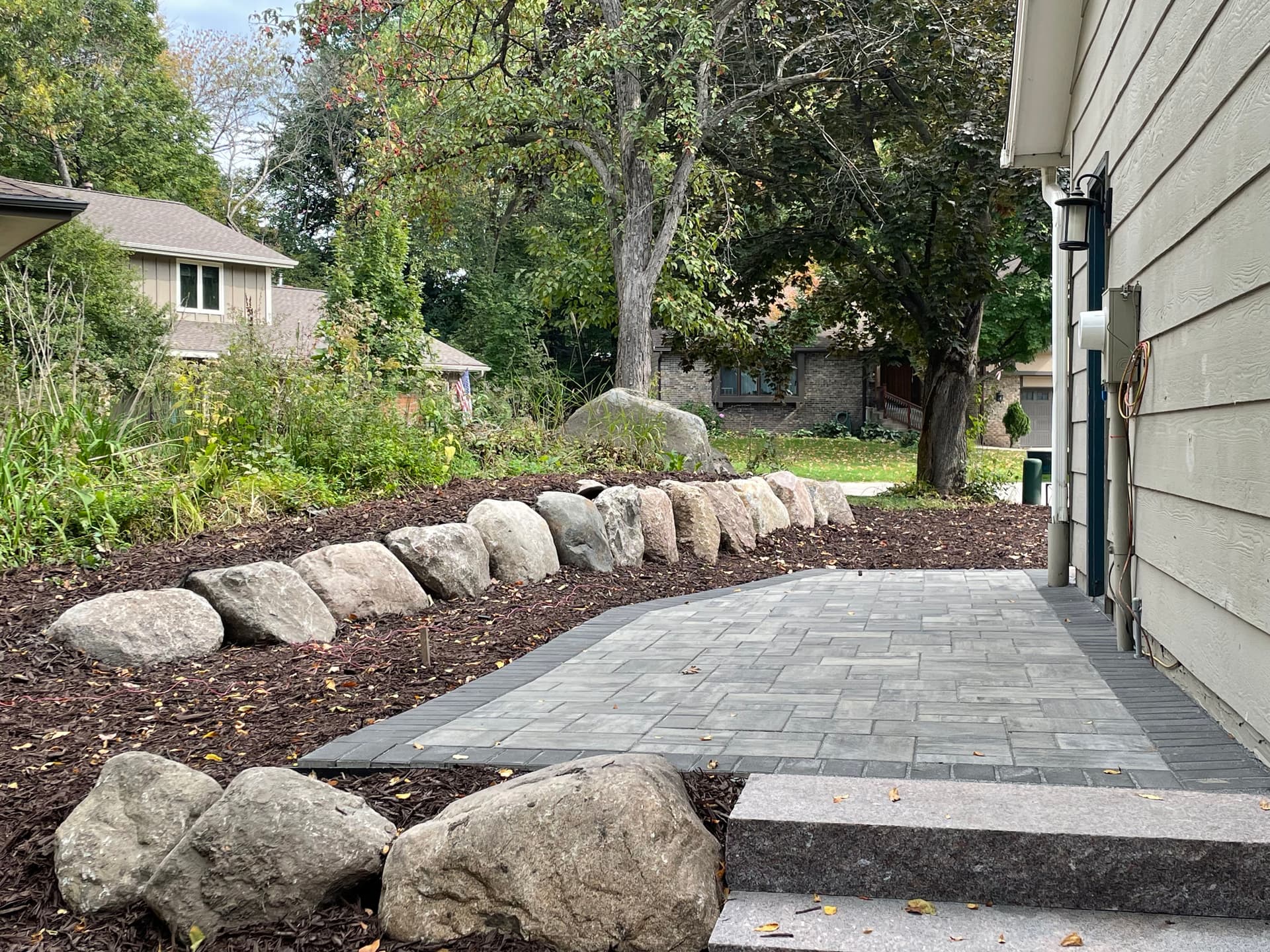 Enhance Your Yard with Our Expert Retaining Walls and Paver Solutions