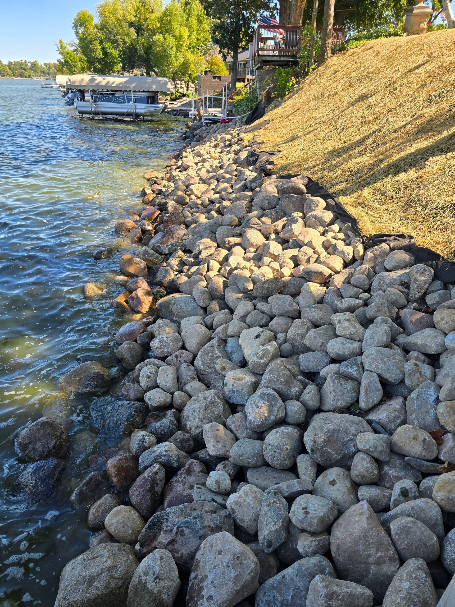 Gallery photos for rip-rap shoreline erosion control in the faribault lakes area: Image #1