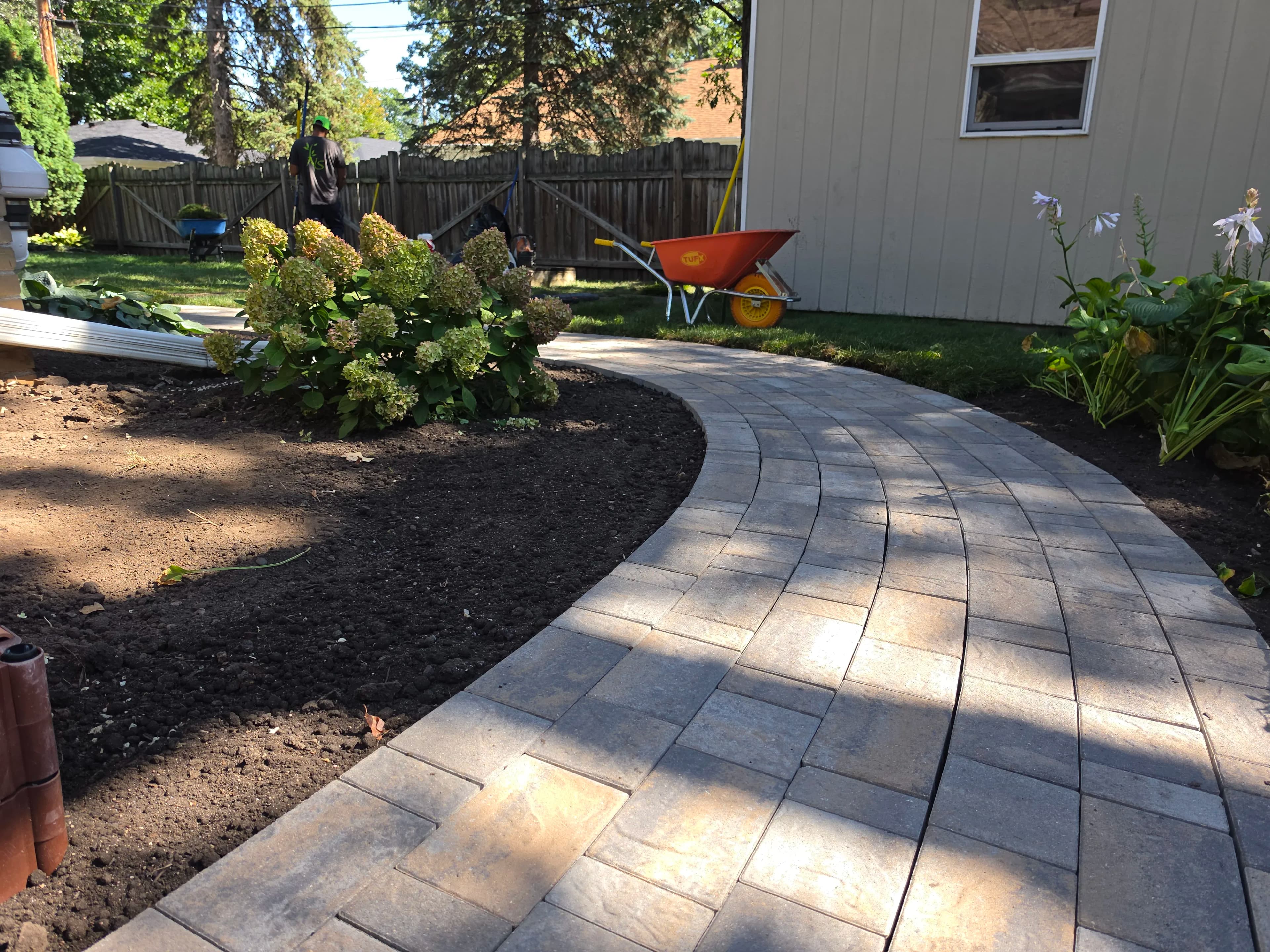 Project Interlocking Paver Walkway Winds Through a Richfield Backyard image