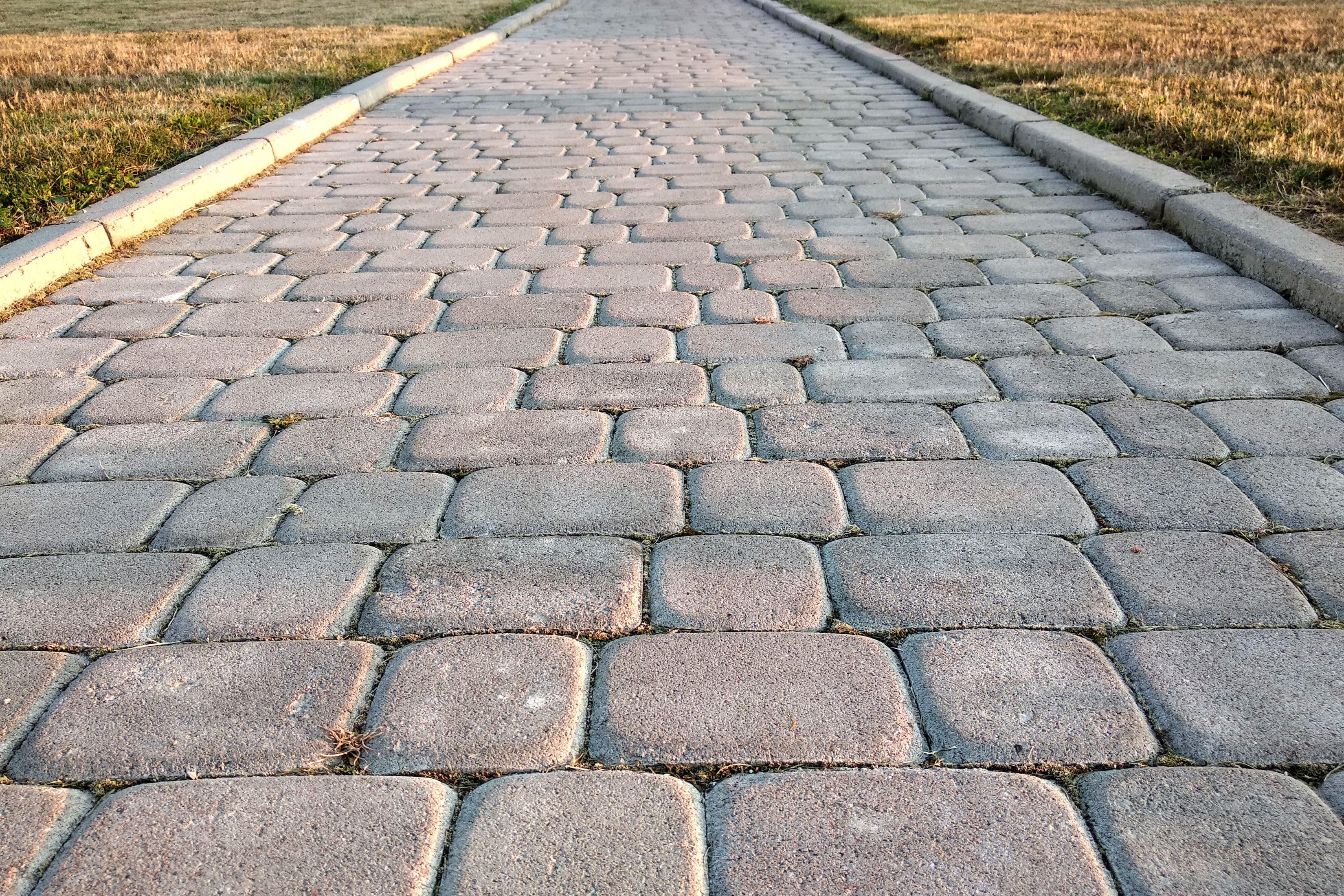 Featured post - Benefits of Pavers vs. Stamped Concrete: Which Is Right for Your Outdoor Space?