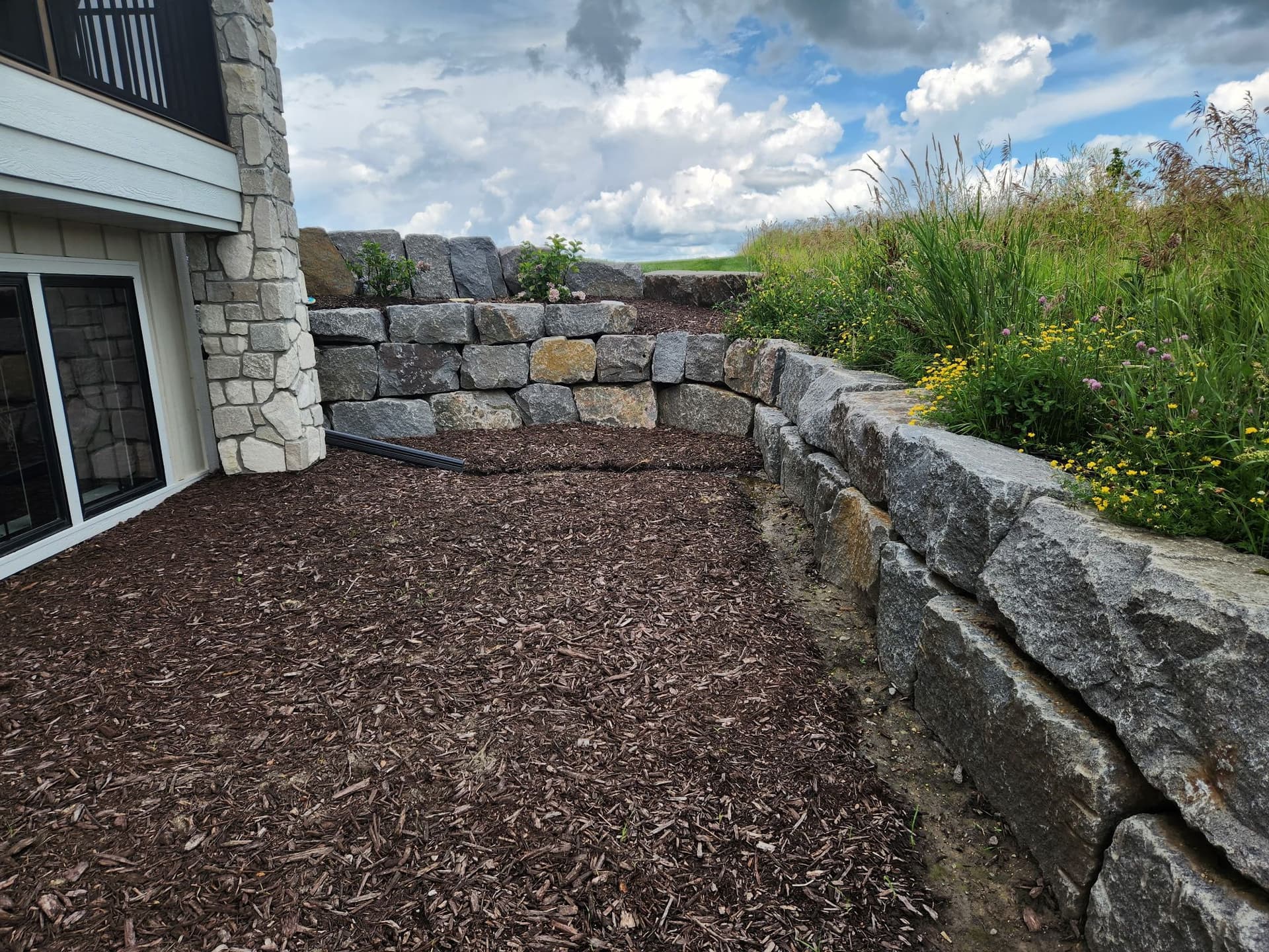Gallery photos for Granite Boulder Retaining Walls Built to Last in St. Cloud: Image #1